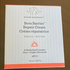 Drunk Elephant Moisturizer White and Orange